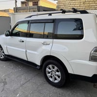 باجيرو ٢٠٠٩  محرك ٣٠٠٠ رقم بغداد  تدفه تبريد  لايت عدسه زنون  كشنات جل...