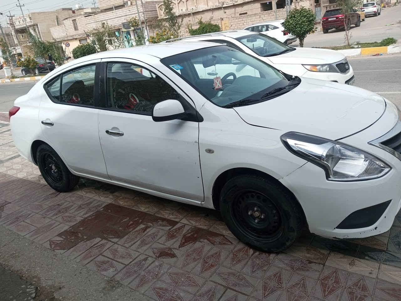 سلام عليكم نيسان صني الهندي موديل 23 مكان الناصرية رقم ***********
