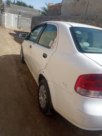 افيو ٢٠٠٦ • ١٤٠٠ • كير عادي