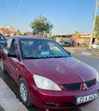 لانسر ٢٠٠٨ • اوتوماتيك • محرك ١٤٠٠