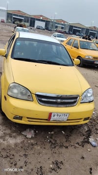 للبيع فورنزا 2008 گير اوتوماتيك حادثها باب السايق و الچاملغ فقط  السيا...