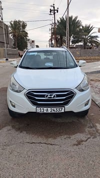سياره توسان خليجيه 12محدثه 14مكينه 2000   رقم بغداد انكليزي بسمي سنويه...