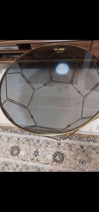 طبلة وسطية • طاولة ذهبية