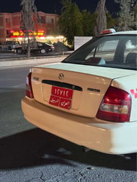 تاكسي • مازدا 323 • ٢٠٣١
