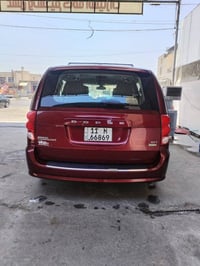 دوج كرفان للبيع ٢٠١٩اللون كرزي هاتف 07713227551