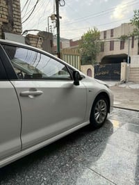 كورلا 2025 هايبرد شكل الخليجي  مكفولة كفالة عامة  ماشية الف سياره جديد...