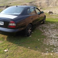 نوبيرا • ١٩٩٨ • تكييف