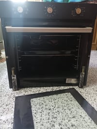 فرن كهربائي • شغال • الجامة مكسورة