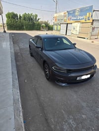 للبيع فقط جارجر R/T 5700  موديل 16 رقم بغداد بدون ارباك بيه طخات بسيطه...