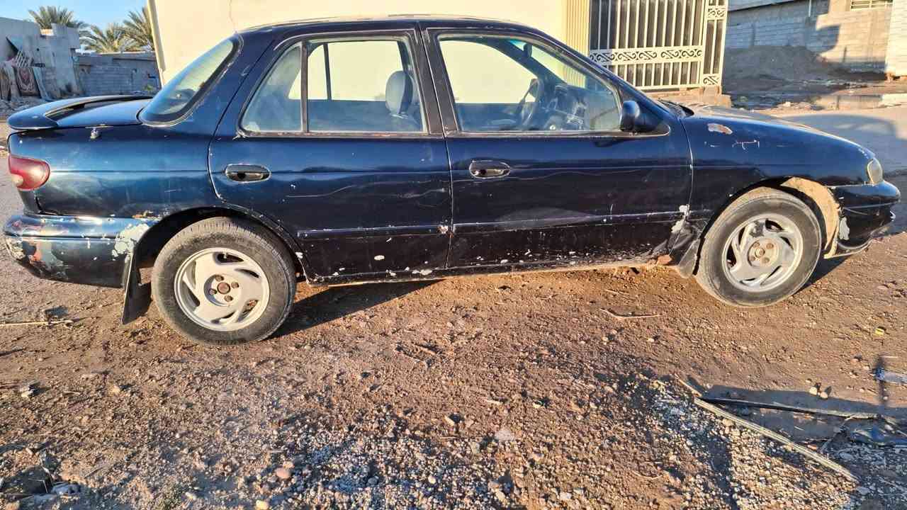 كيا سيفية موديل ٩٥ 
سنوية ٢٠٢٧ باسمي مشروع وطني رقم بغداد انكليزي 
محرك جديد كير خير من الله 
*********** متواجد واتساب فقط
