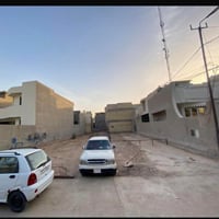 قطعة ارض خلف كلية دجله قريبه من السده ( نهر دجله ) تحت جسر الطابقين  ح...