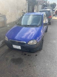 سيارة اوبل كورسا للبيع موديل 95 محرك 1400 مفتوح وكير عادي السيارة بحال...
