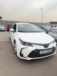 كورلا هايبرد 2024 للبيع ماشية 14الف  السيارة بيها تبديل جاملغ امامي جه...