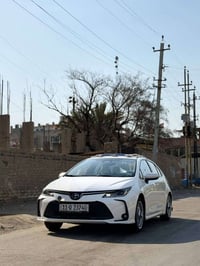 للبيع كورلا هايبرد موديل ٢٠٢٤ الوجبة الولى ماشية ٣١ الف سيارة كفالة عا...