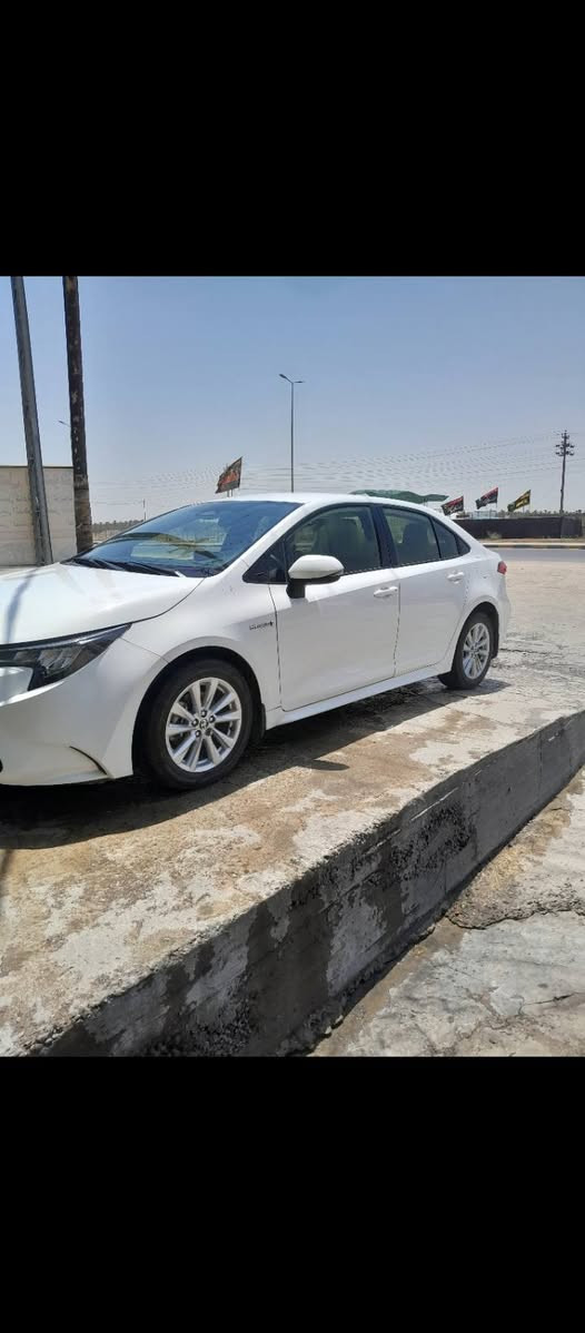 سياره كورله هايبرد موديل 2023وارد ياباني سياره بدون حادث مكفوله من لضربه فقط صبغ بدون دواخل سياره جديده مرقم بابل باسمي 120 ورقه ***********

