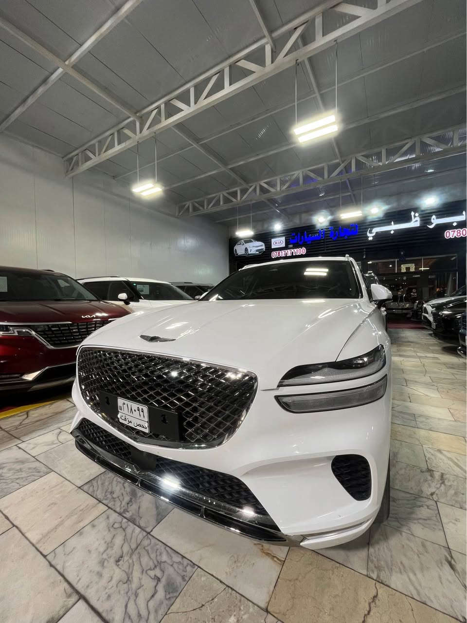 🚗 للبيع: جنيسيس GV70 م 2023
📍 مكان السيارة: النجف الأشرف
📞 للتواصل: ***********
💰 السعر: 300 ورقة – قابل للتفاوض
📊 المسافة المقطوعة: 35 ألف ميل
🛠️ المحرك: 4 سلندر – 2500cc توربو

⚠️ حالة السيارة
• وارد أمريكي (دخول جديد)
• الأضرار: حادثها ربع الدعامية فقط، وتم استبدالها بقطعة أصلية بنفس اللون (بدون صبغ)
• صور الحادث مرفقة 

⚙️ المواصفات (فول مواصفات):
• فتحة سقف بانوراما
• بصمة تشغيل
• تشغيل عن بعد
• مقاعد جلد (تدفئة + تبريد + مساج) مع ذاكرة خزن لوضعيات المقاعد
• رادارات كاملة (أمامية + خلفية + جانبية)
• شاشة وسطية كبيرة
• كاميرا خلفية
• وبقية المواصفات المعروفة

📌 تفاصيل إضافية
• دخول جديد بدون رقم (تترقم جميع المحافظات عدا الإقليم)
• المنفيس باسم المالك
• لون السيارة: أبيض النجف, العراق
