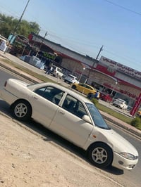 بروتون 2004 رقم بغداد مكينه وكير جيد نقص حداديه وحدة خلفيه فقط جهه الي...