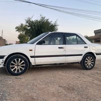 مازدا 323 • 1990 • كفالة سنة