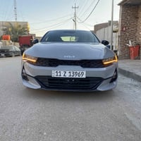 للبيع K5 موديل 2023 اللون اسمنتي وارد امريكي ظرر جاملغ وبنيد ومبدلات ن...