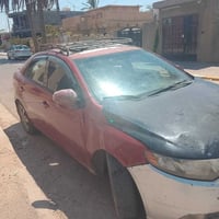 فورتي2010 مكينه كايمه رقم واسط  لون احمر محرك 2000 كشر تعبان فتحت سقف ...