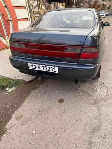 السلام عليكم من رخصة الادمن كرونا موديل ٩٢ محور سيارة صبغ عام للجماليه فرن درجة اولى  كير محرك ع الفحص تخم تايرات باتري جديد رقم بغداد انكليزي مميز السعر ٥٢ عنوان بغداد الاتصال *********** بغداد
