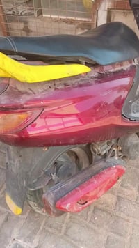 بصره كرمت علي • مكاني ٢٠٠ • دراجة نارية