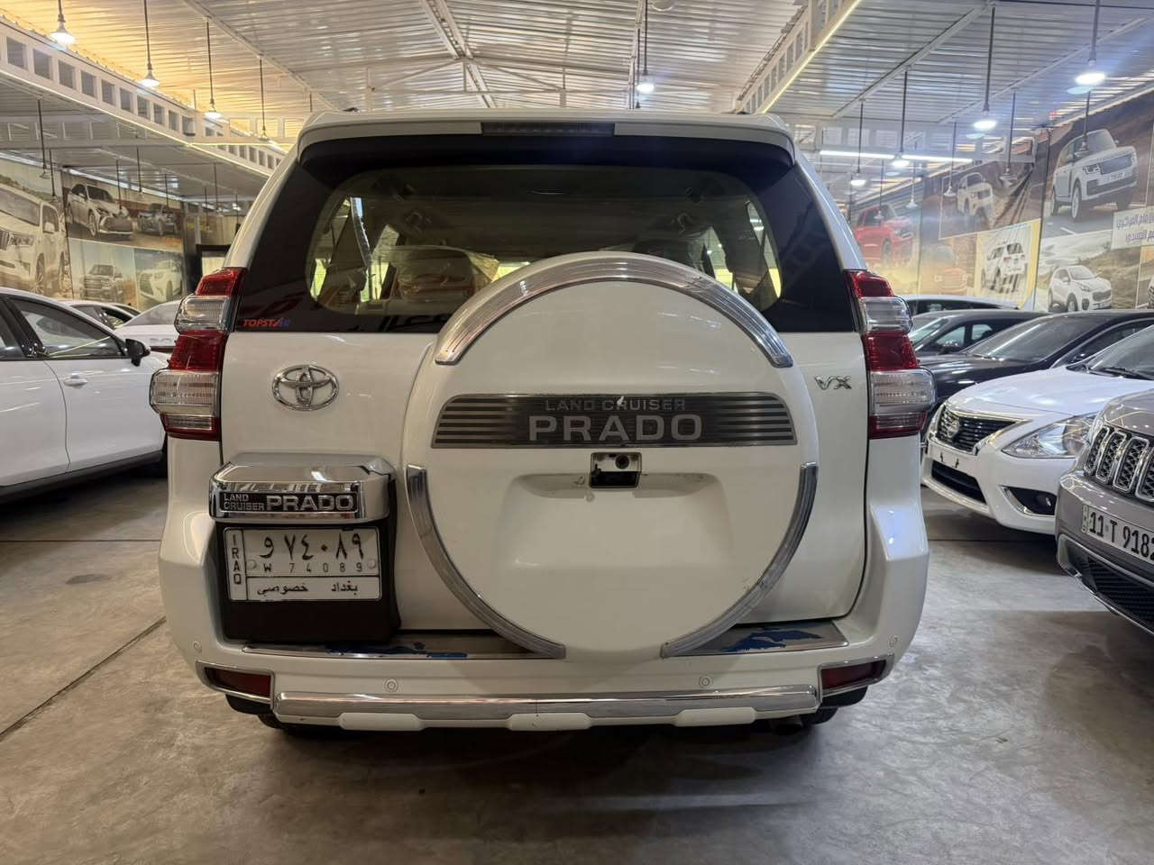 🔷 معرض الإمام المركزي 🔷
📍 العنوان: بغداد – الكريعات – شارع الوقف السني

⸻

🚘 تويوتا برادو 2014 VX
🔹 فول مواصفات – رقم بغداد

المواصفات:
 • بصمة فتح وتشغيل
 • مقاعد جلد
 • كراسي كهرباء
 • تبريد كراسي (أمامية + خلفية)
 • لايت زينون
 • زراك لايت
 • ستيرن كهرباء
 • 6 سلندر
 • محرك 4000
 • 7 ركاب
 • 3 قطع
 • عداد المسافة: 114,000 كم

الحالة:
 • السيارة بيها شخوط خفيفة (غير قوية) جهة عكس السائق
 • بارد بمقدار إصبعين بالبلب، والباقي مكفول

⸻

💰 السعر: 320$
✔️ مجال بسيط

⸻

📞 للاستفسار:
***********
***********
