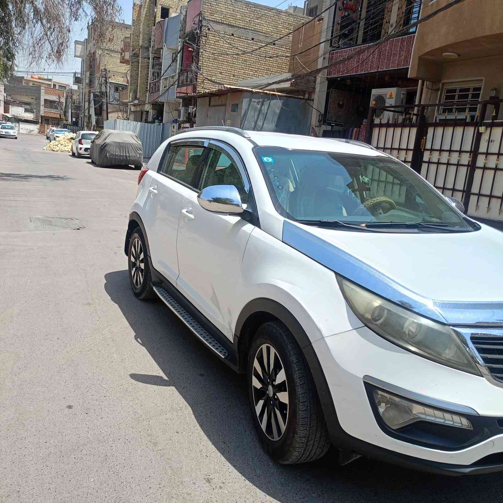 اخوان سبورتج ٢٠١١ خليجي رقم بغداد انكليزي سنوية بسمي لون ابيض السيارة كير مكينة صدر تبريد مكفول السيارة بيها اتلاث قطع صبغ بدون معجون بدون دواخل السيارة نضيفة كولش سعرها 114 وبيها مجال بسيط مكاني بغداد ساكن بصليخ وهذا رقمي ***********
