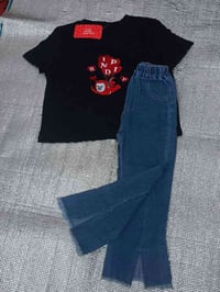 ملابس أطفال • قطعة