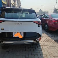 سبورتج ٢٠٢٤ • أبيض صدفي • دفع رباعي