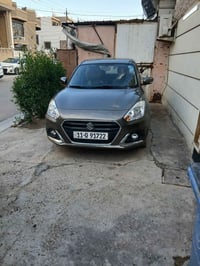 سازوكي دزاير 2024 تقريبا زيرو ماشيا ١٨ الف السياره أربعة سلندر محرك 12...