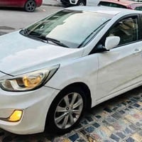 عندي اكسنت ٢٠١٥ خليجي رقم بغداد الدولي  جديد سنويه وأرقام وهزه كله جدي...