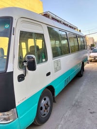 كوستر موديل 2006لبيع سعر 170بيه مجال 07723531101