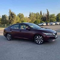 نيسان سنترا موديل SV 22  فوول مواصفات للأخير  لون جوزي كرزي مميز  بصمه...