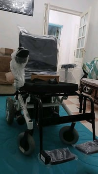 كرسي متحرك كهربائي • فل المشي