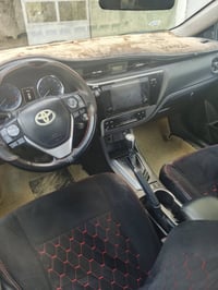 كورلا 17 لون أبيض وارد كندي xse رقم اربيل ضررها قطعتين سعرها 145 الاتص...