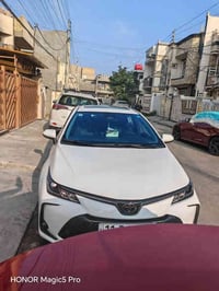 كورلا هايبرد 2025 الشكل الخليجي فتحة سقف  مقاعد جلد مثبت سرعة مانع انز...