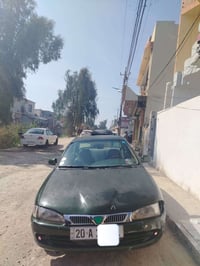 بروتون 2002 • كير عادي • رقم ديالى