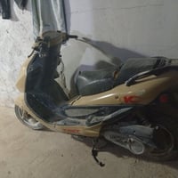 دراجة كامكو • عطلانة • كفرات نضيفة