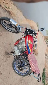 من بعد تحيه السلام يوجد دراجه نوع ايراني محرك نامه موديل 22 تواير جدد ...