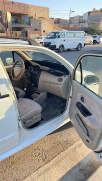 كيو كيو • ٢٠١٢ • باب السائق مبدل