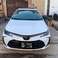 كورولا 2024 • كورولا هايبرد • سيارة تويوتا • رقم بغداد • كفالة عامة • ...