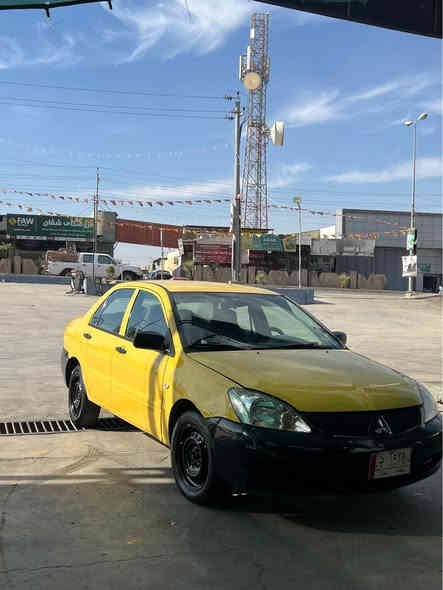 لانسەر ٢٠١٠  مەکینە گەورە سەنەوی پلاستیک سەیارەکە زۆر پاکە لێدران و بۆیاخی نیە گێر و مەکینە بە شەرت براوە و موس نیە  سەیارەی مەعرەز نیە مالی دۆستە سعری ٥٠ و مەعامەلەی برایانە      رەقەم.   *********** شمشمل
