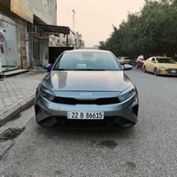 كيا فورتي • قير أوتوماتيك • رمادي ميتاليك