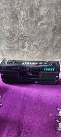 مستعمل • راديو مسجل • يشتغل على باتري