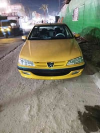 بيجو بارص ١٥ بسمي رقم بغداد انكليزي  سياره بيه بس ربع جاملغ الخلفي وال...