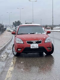 كيا ريو برايد 2010 وارد كوري داخل اسود  قطعه وحده صبغ باب خلفي  ملاحظا...