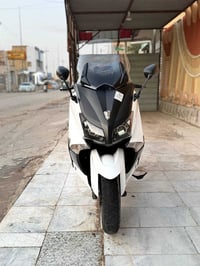 تي ماكس ١٤ • ٢٣ الف • ابيض صدفي