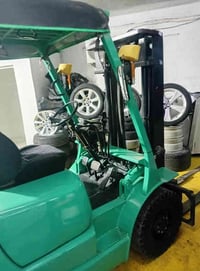 رافعة متسوبيشي  للبيع موديل 2003 كاز 2 طن ونص جب حاوية 3 حركات محرك ام...