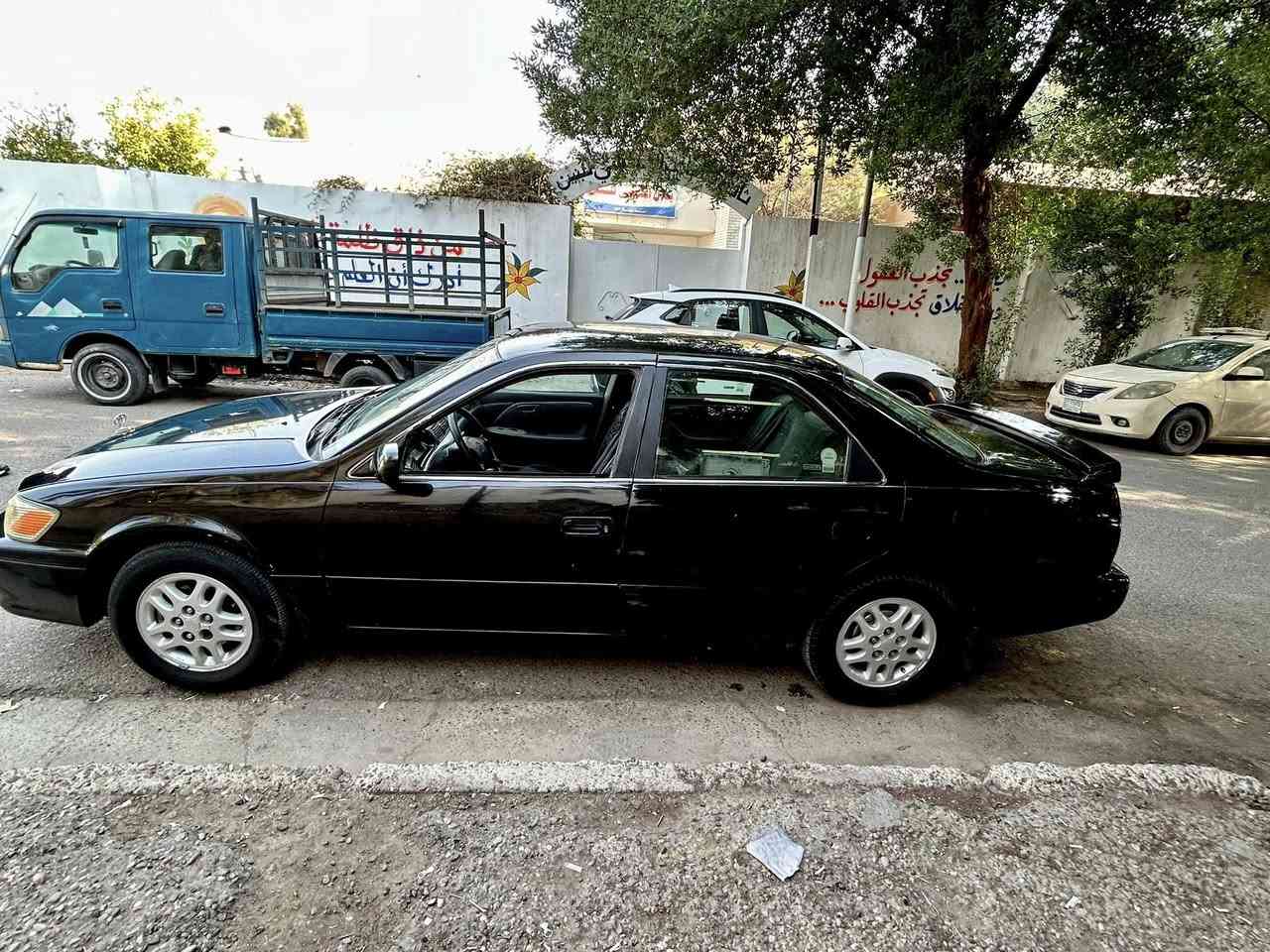 كامري 2001 لون اسود ، وارد امريكي ، رقم بغداد انكليزي بأسمي 
📌نصبة حلوة رئاسية🇯🇵
📌 مكينة 2200 ابو الكف ، 4 سلندر 
📌 كفالة عامة مكينة ، گير ،  شواصي ، لغود ، تكم 
📌مصبوغة عام جمالية
📌ضربتها خفيفة جاملغ خلفي 
📌تحكم جام كهرباء 
📌تبريد تدفئة ممتازة 
📌سويتلها ادامة كاملة على ايدي قبل اسبوع بدلت صدر  امامي وخلفي ويه الدبلات جديد سويته كله اصلي مو تجاري 
📌 بدلت عنبار بريك وسلف اصليات كلهم 
📌غرفتها حلوة نظيفة ما ناقصها شي 

📌السعر ٧٨ ورقة 💵 وبيها مجال

📍مكاني / بغداد 
***********
